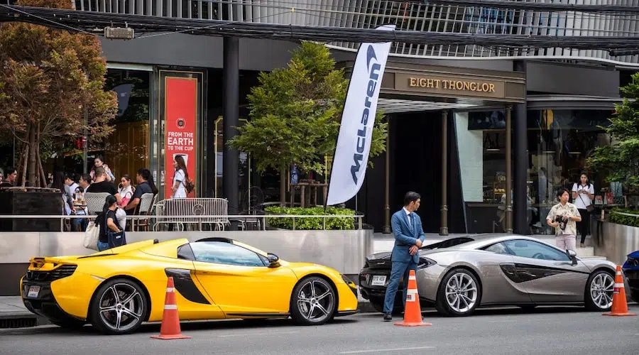 mclaren sports cars parked in front of 8 thonglor in Bangkok