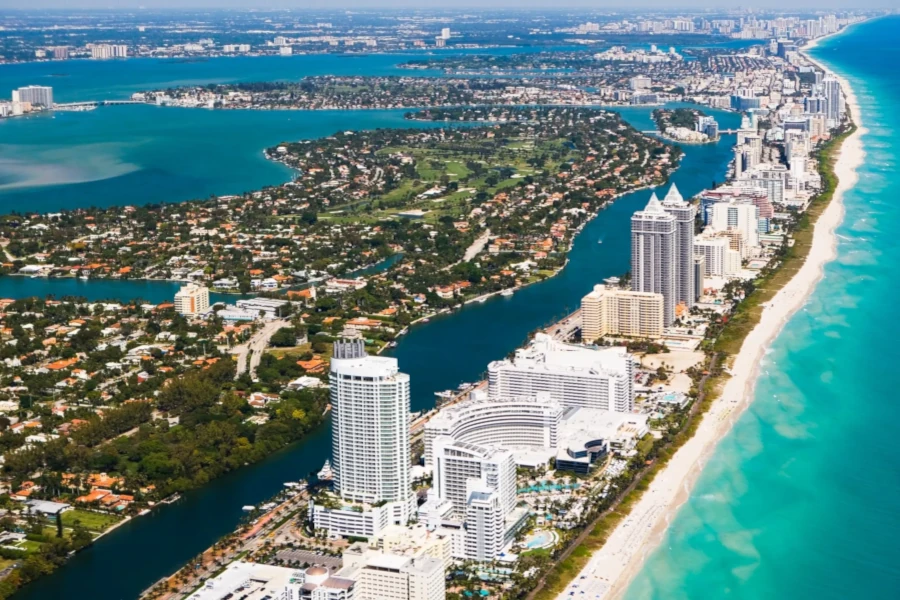 Superb aerial view of Miami with skyscrapers and the beach