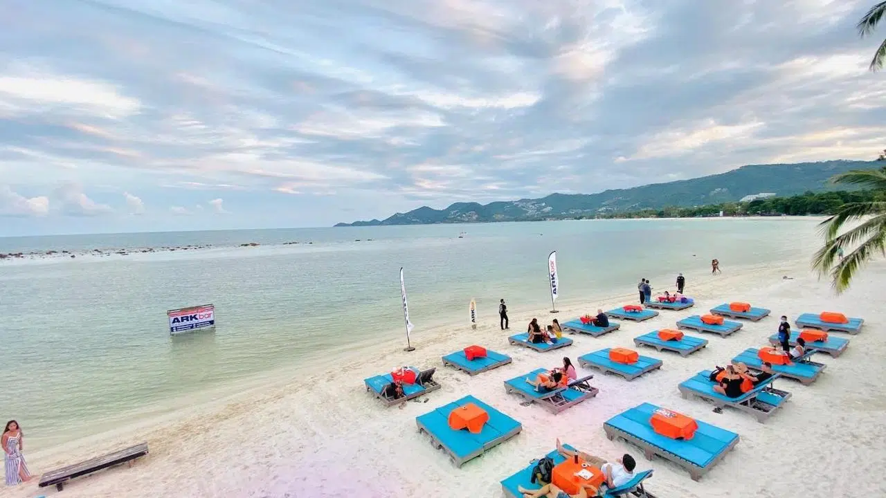 sunbeds on the beach at Ark Beach club in Koh Samui Thailand