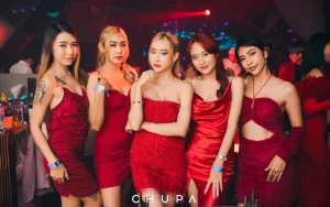 awesome sexy Thai girls wearing red dresses at Chupa BKK Club in Bangkok