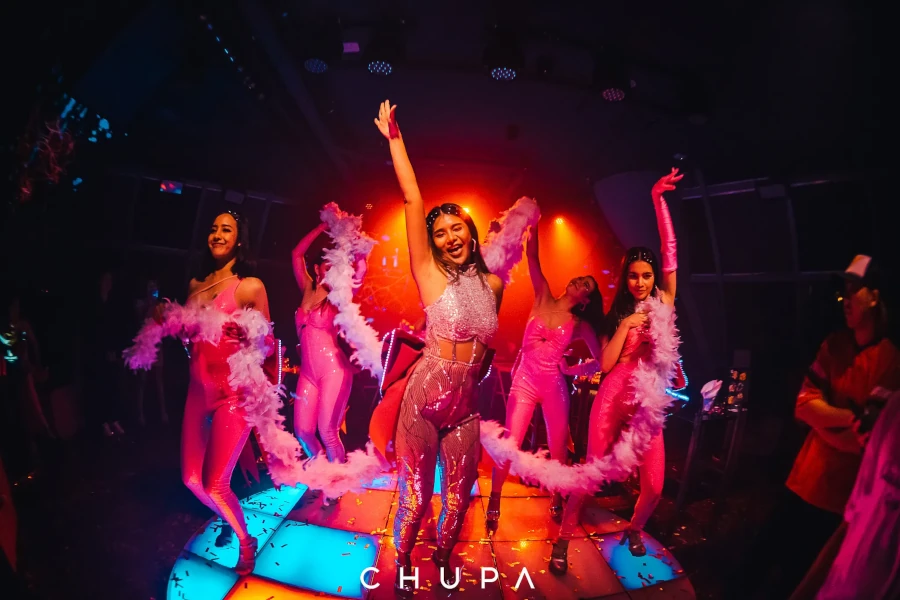 Beautiful dancer team with pink clothes at Chupa in Bangkok