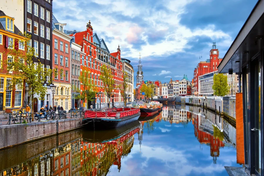 Beautiful photo of Amsterdam with the Amstel river and colored houses
