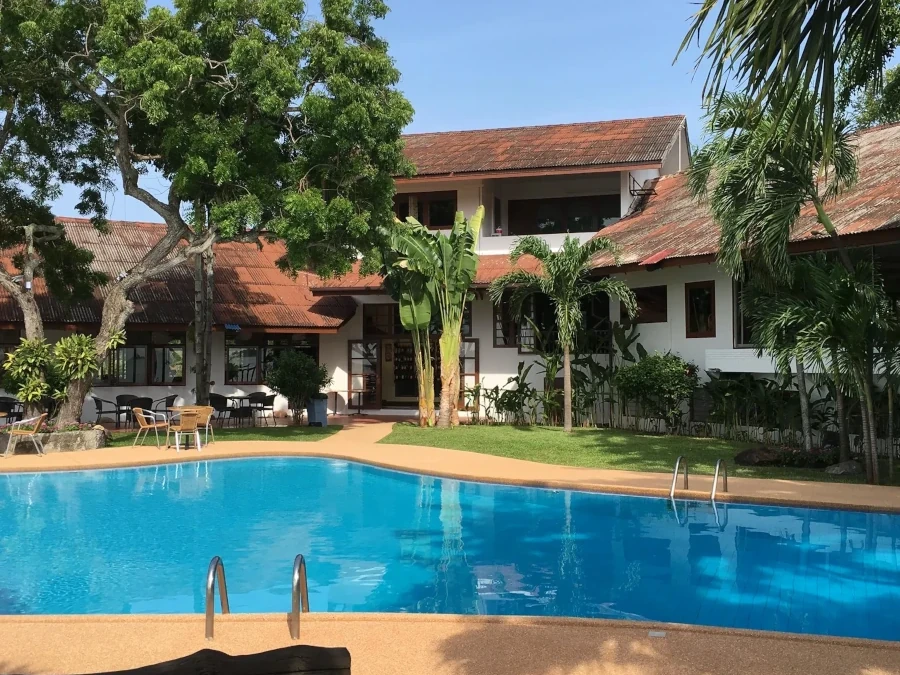 Scenic poolside view at Bangsaray Beach Club Pattaya, offering a perfect relaxation spot by the water.