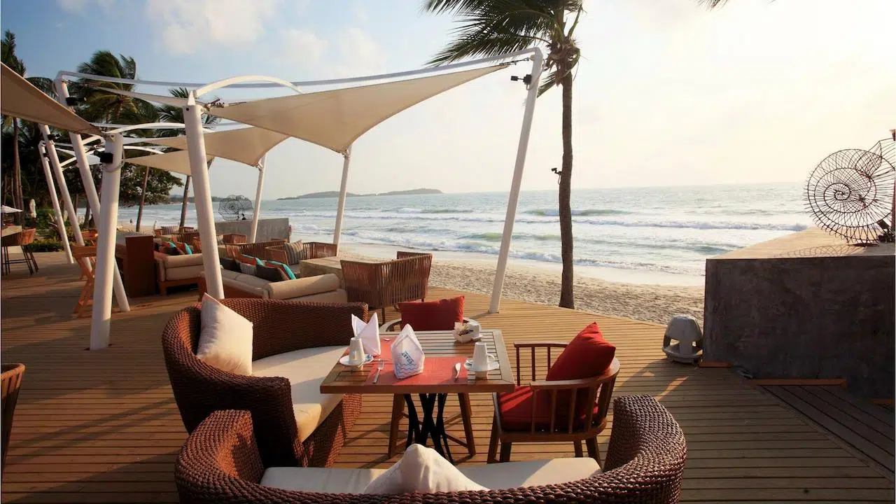 terrace by the beach at Coast beach club in Phuket Thailand