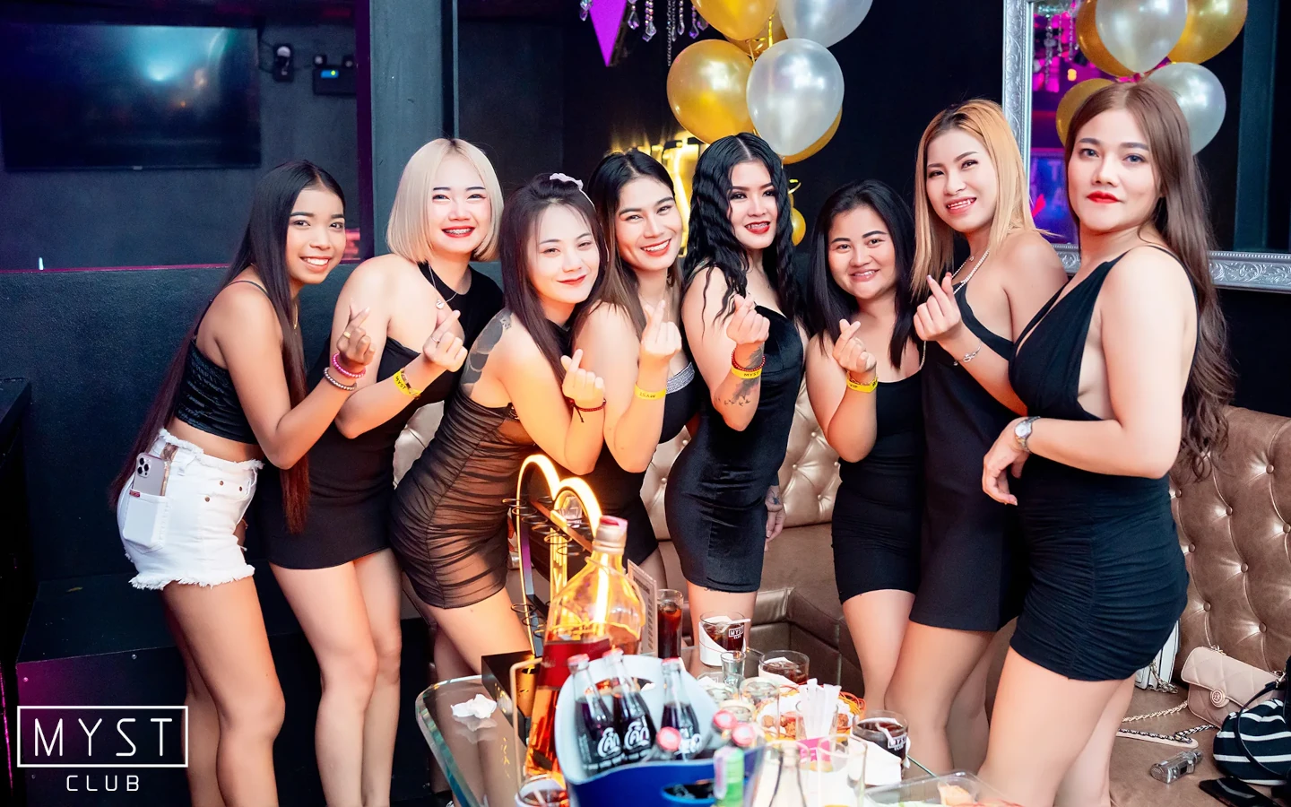 Girls enjoying drinks at Myst Club Pattaya.