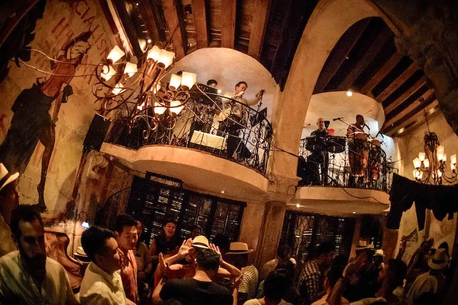 ground floor of Havana social cocktail bar in Bangkok with latino live band playing upstairs