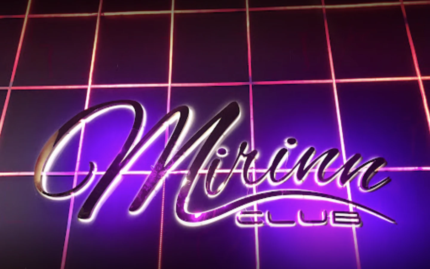 The neon sign of mirinn club in rca in Bangkok on a wall