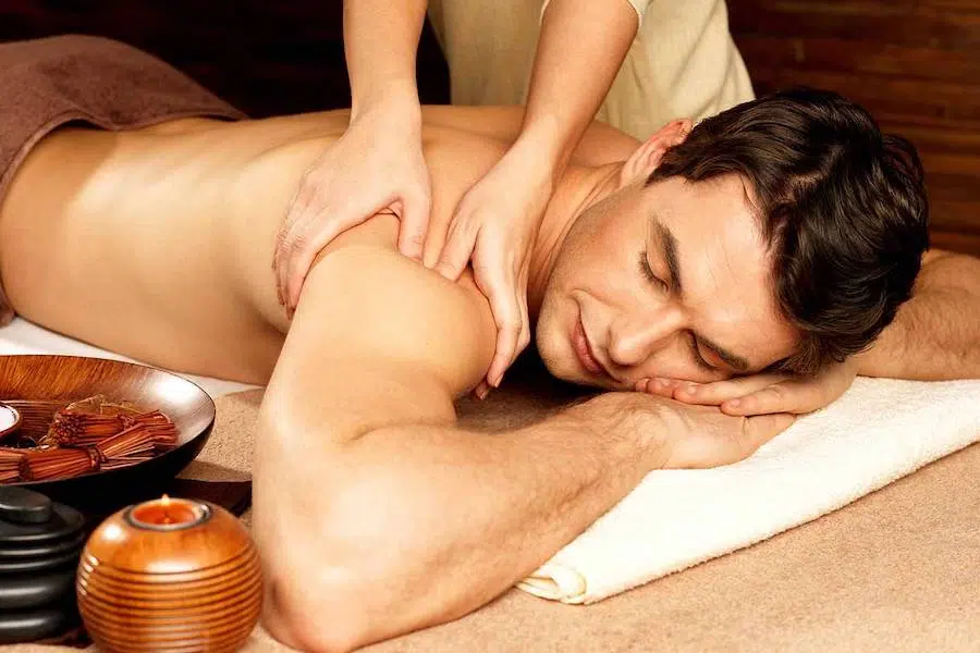 man receiving an oil massage in Thailand