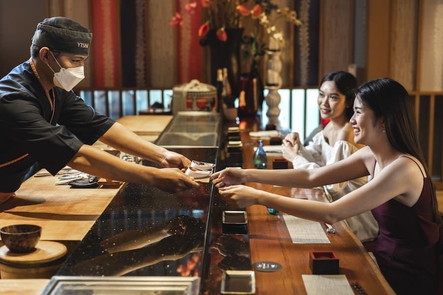Thai girls at an Omakase restaurant in Bangkok