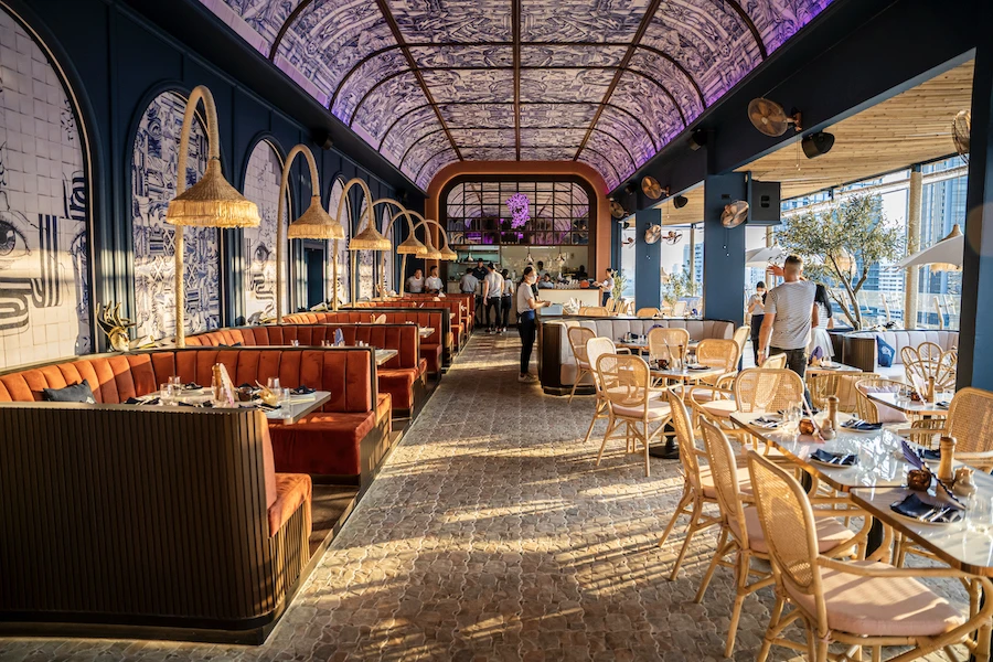 interior of Pastel Rooftop bar in Sukhumvit soi 11 in Bangkok Thailand during the sunset