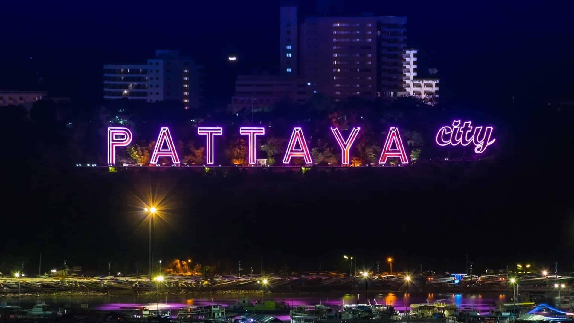 pattaya city purple neon sign