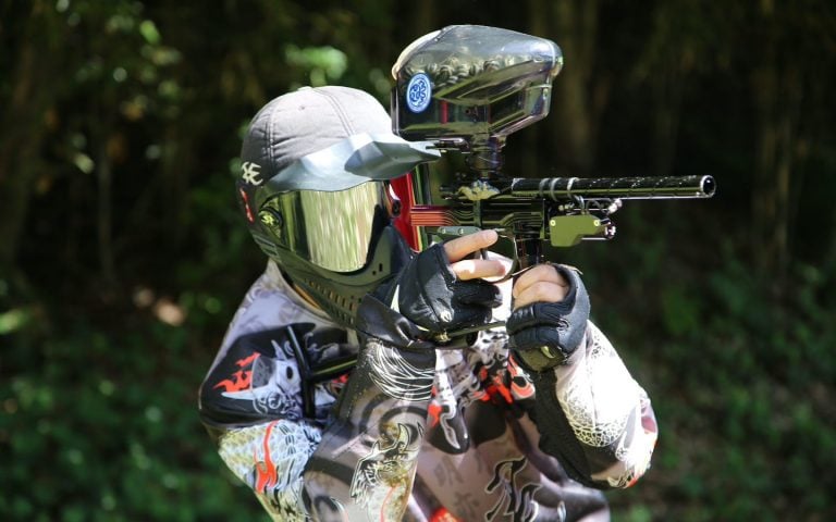 player of paintball in Bangkok with full protection gears and gun