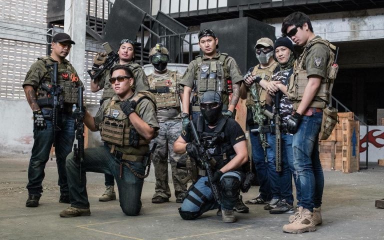 airsoft players in Bangkok wearing military gear at At One Airsoft Fields