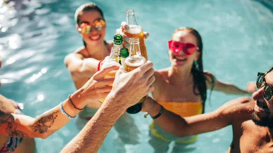 people drinking in a pool