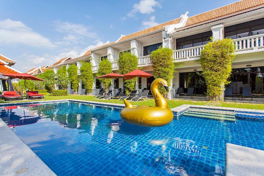 golden floatable in a private pool resort in Pattaya