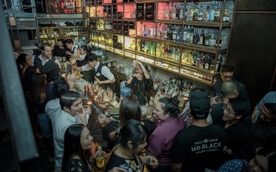 people partying at Rabbit Hole cocktail bar in Thonglor Bangkok