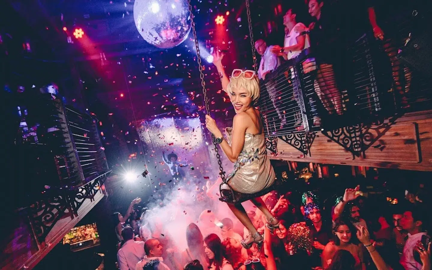 girl on a swing at Sing Sing Theater nightclub in Bangkok
