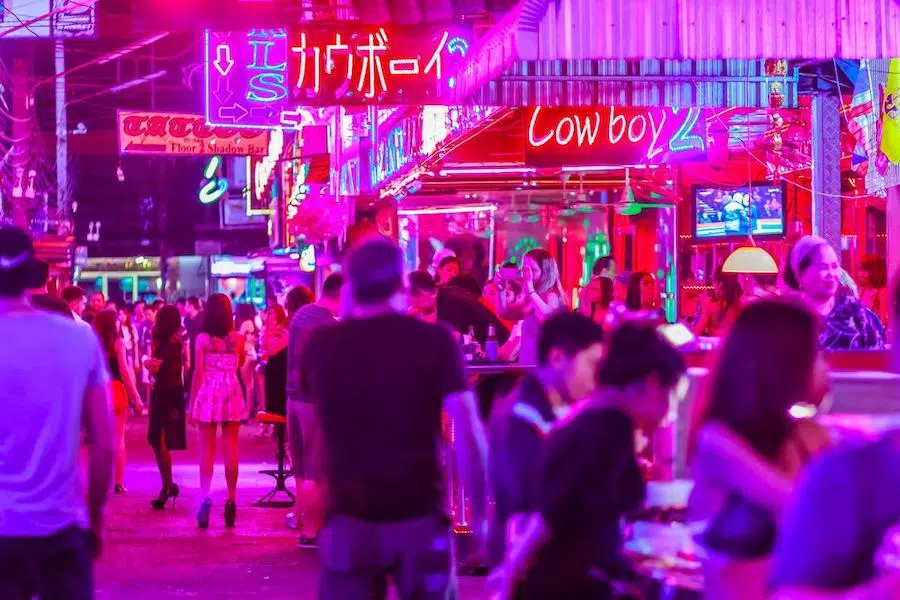 soi cowboy in Bangkok with pink neon lights