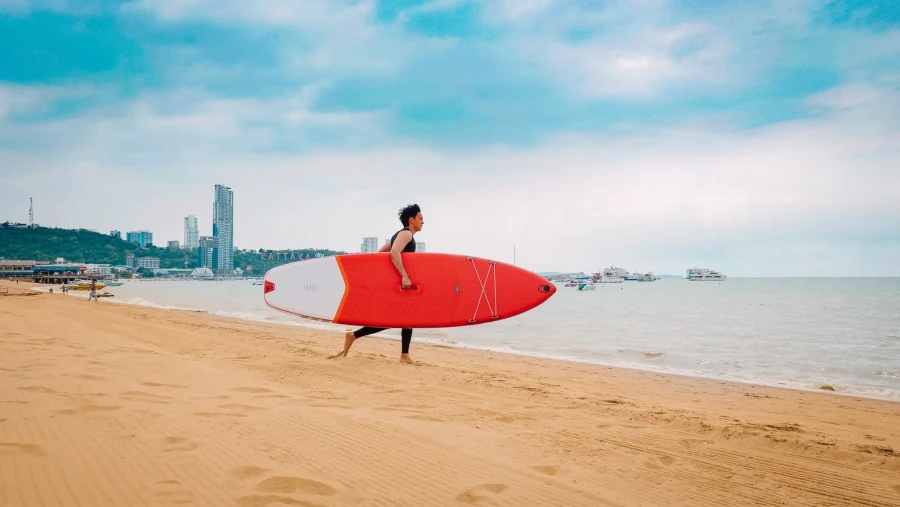 Surfer at Pattaya Beach.