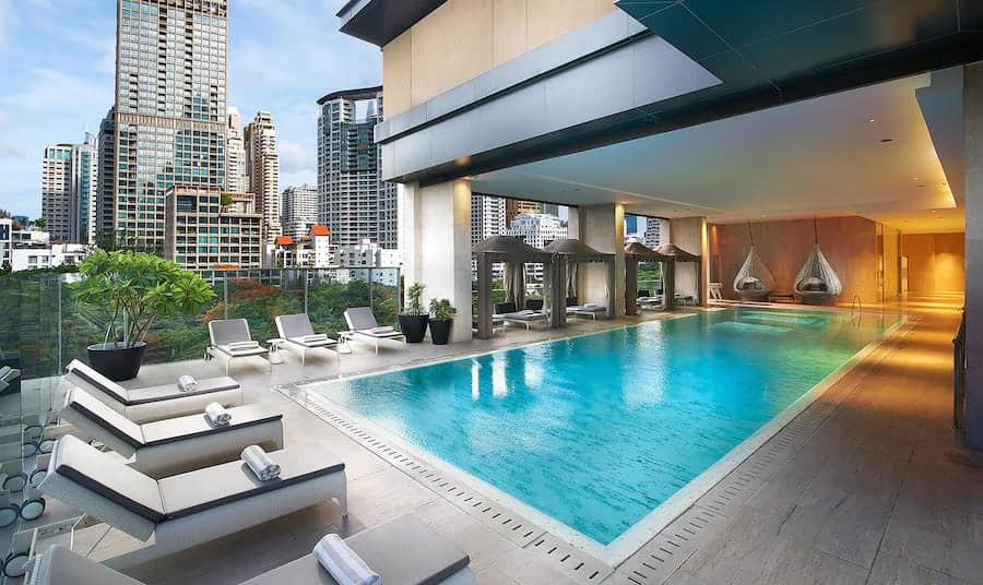 swimming pool with city view at the oriental residences in Bangkok