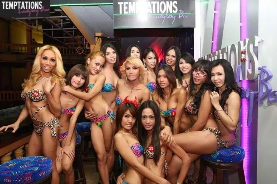 ladyboys in front of Tempatations ladyboy bar in Nana Plaza