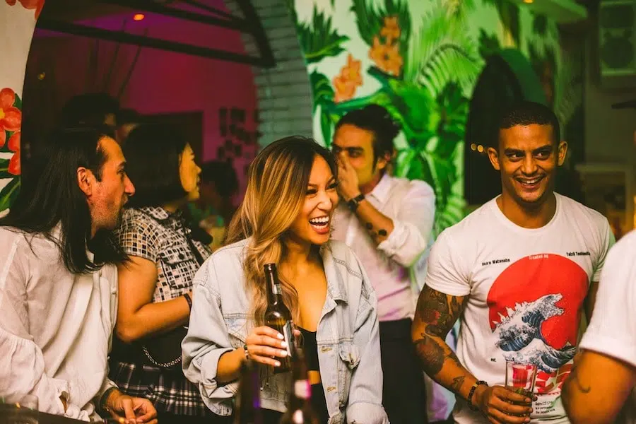 Thai girl laughing at Tropic City cocktail bar in Thailand