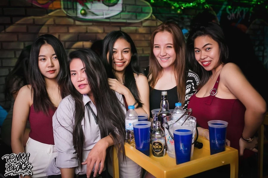 Thai girls drinking at penny black asoke nightclub