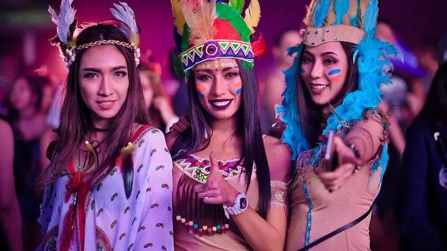 girls with indian costumes at a music festival in Thailand