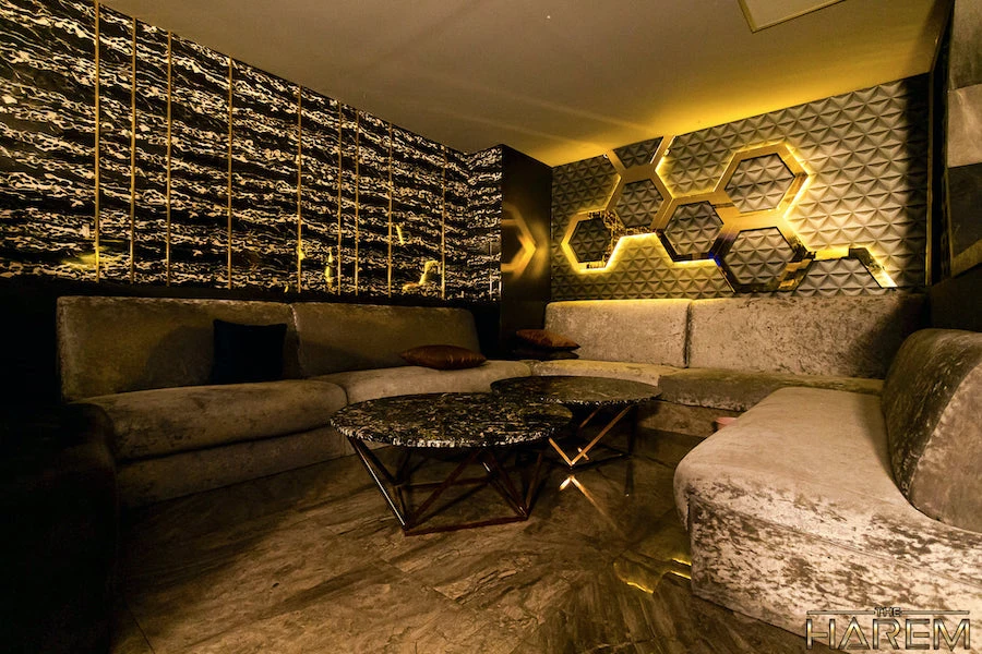 VIP room with cushy sofas at The Harem gentlemen's club in Bangkok