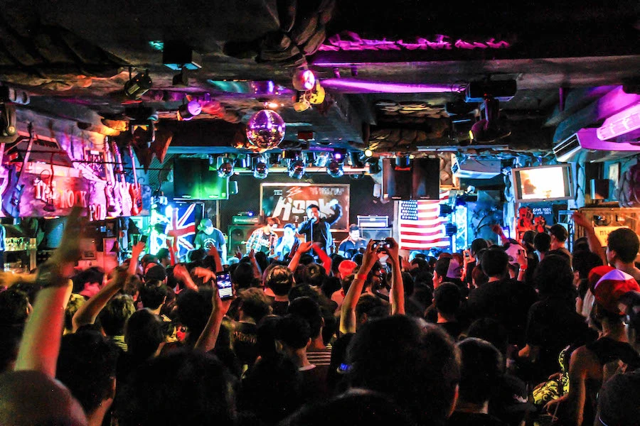 rock band playing and crowd going wild at The Rock Pub Bangkok