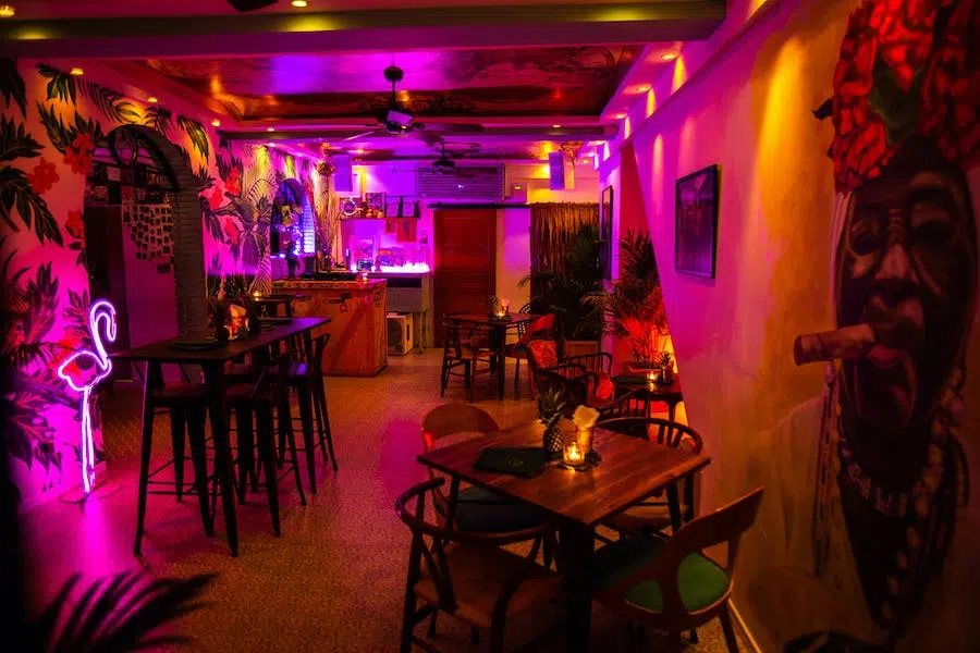 interior of tropic city cocktail bar in Bangkok with neon lights