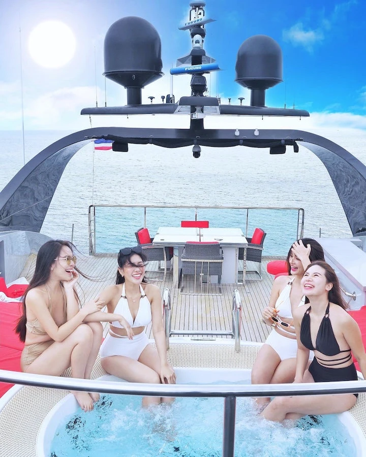 hot Thai bikini models in the jacuzzi of the Ocean Emerald yacht in Thailand
